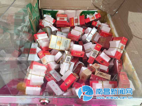 南昌一男子沉迷街头“抓烟机” 一个月输了8000元