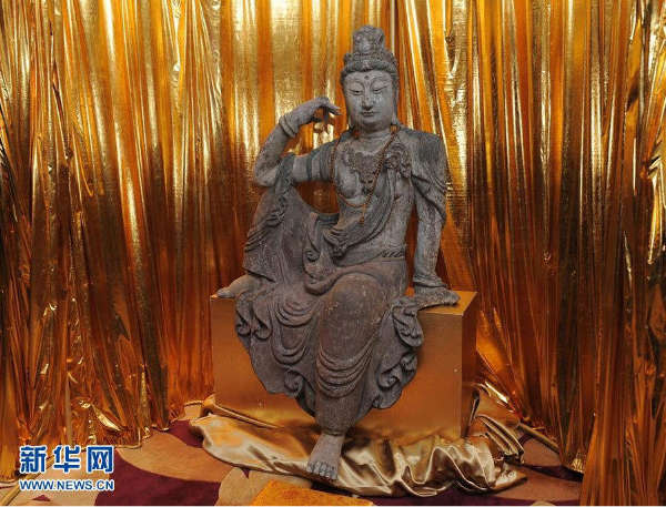唐代木质自在观音菩萨雕像回归中国_海南频道_凤凰网