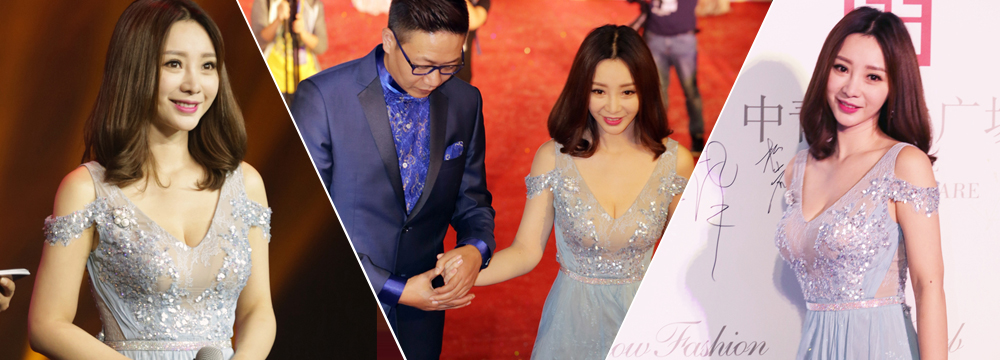 柳岩穿低胸装现身捞金 获搀扶显大牌
