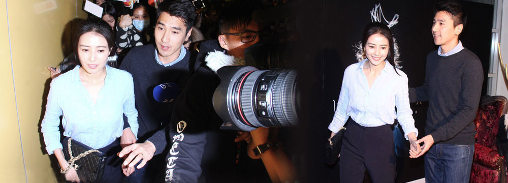 高圆圆观看张惠妹演唱会 获老公紧搂呵护一脸幸福  