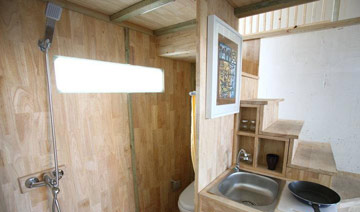 
大学生建标准一居室小木屋造价不足一万 你心动吗？