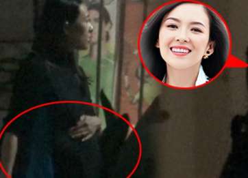 章子怡挺巨肚外出 腹部隆起但素颜长发依旧美