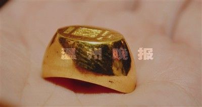 中国黄金9999金元宝。(图片来源:温州网)