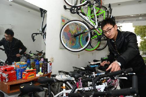 90后大学生开自行车专卖店 倡导绿色出行|普林