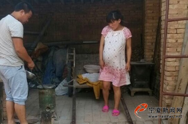 怀孕的胡文芳。