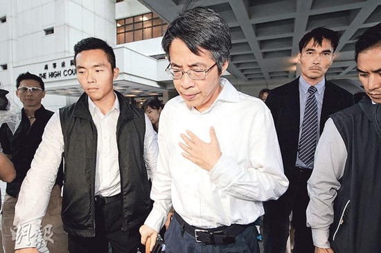 刘进图昨出庭作供。香港《明报》图