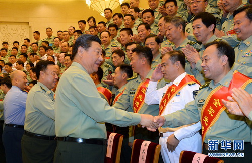 2014年9月22日，习近平在北京接见全军参谋长会议代表。新华社记者李刚摄