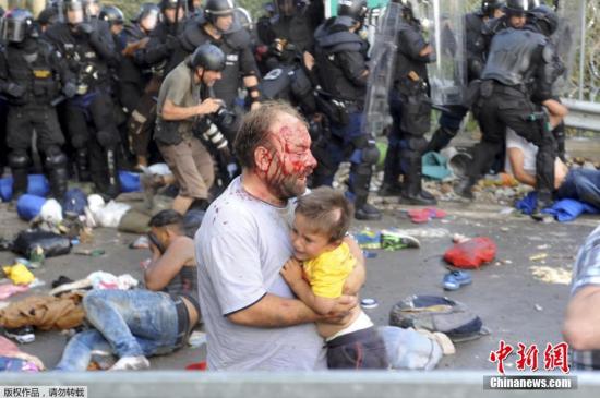 默克尔访土就难民分配问题表乐观 承诺将加速