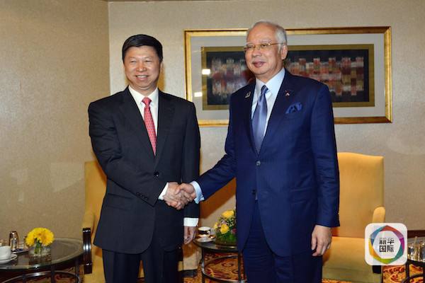 (图片说明:4月12日马来西亚马来民族统一机构主席、政府总理纳吉布在吉隆坡会见中联部部长宋涛。)