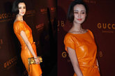 张歆艺用视觉效果突出的橘色优雅连衣裙作为这次活动的战衣，简单时髦的都会女郎形象。不会过分抢镜，却很得体。