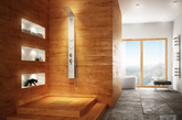 浴室一般很少用到木制材料，然而桑拿房却是例外。今天推荐的是桑拿房风格的浴室设计，我们可以看到，在木材和石材的运用上都充满与众不同的气质。特别是对木地板的运用，让你犹如置身于真正的桑拿房，使身心都得到适度放松。（凤凰家居编译）