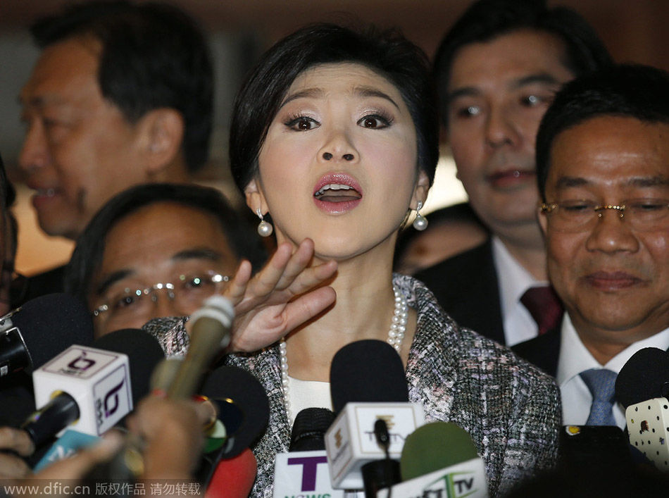 泰国前总理英拉微笑应答弹劾相关问题-中国学