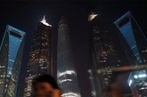 上海中心大厦总高632米，将于今年投入使用。届时，上海中心大厦将成为中国第一高楼，和仅次于哈利法塔的世界第二高楼。（实习编辑：周芝）