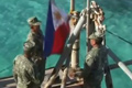 菲在仁爱礁坐滩军舰升国旗 回国士兵获颁勋章