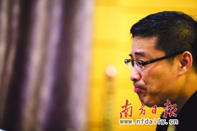 李庆明对自己的离职无奈且伤感。 陈以怀 摄