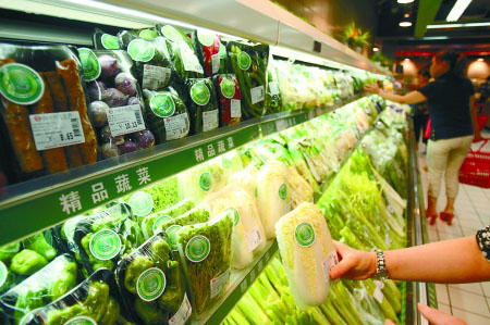 市民嫌贵不买 企业亏本赚吆喝 有机蔬菜苦练忍