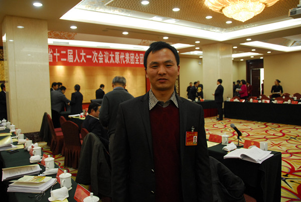 聚焦大学生村官代表:意见建议情牵三农