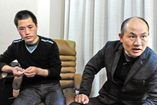 张辉、张高平（右）接受本报记者采访蒋铮摄