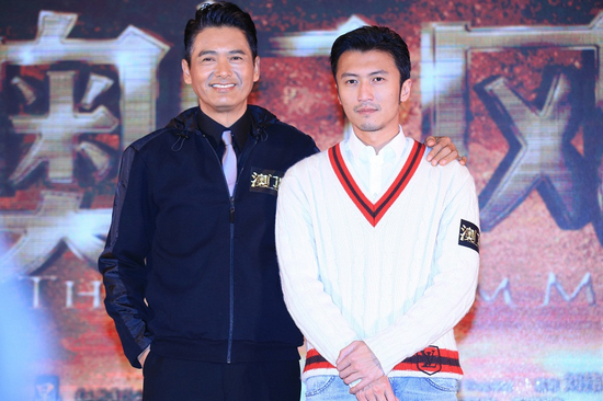 周润发和谢霆锋昨日在京同台亮相,发哥笑言是看着谢霆锋长大的.