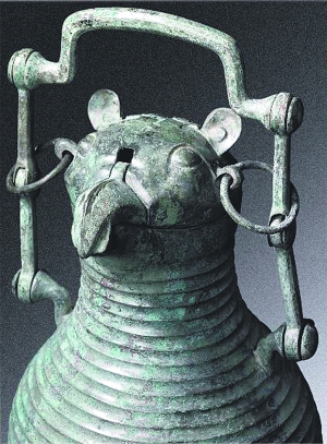 东周早期青铜鸮首提梁壶