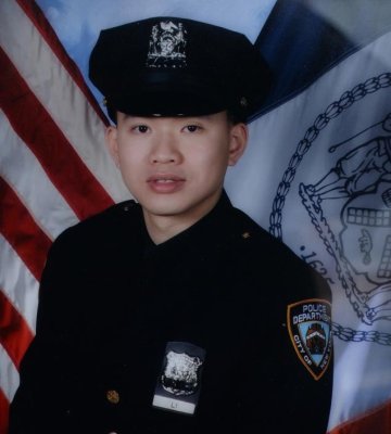 不幸中枪的华裔警员李james 美国《世界日报》图