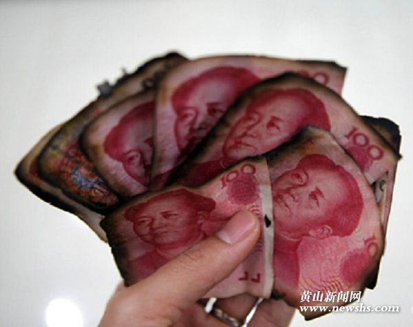 村民家中失火现金被烧 银行鉴定后兑换近5万元新币