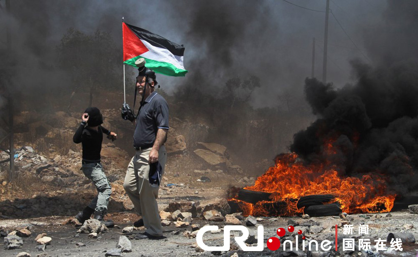 根据媒体报道,至少8名巴勒斯坦抗议者在冲突中受伤.图片来源:cfp